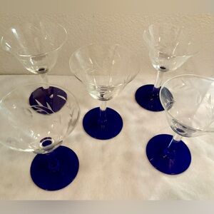 5 Colbolt blue stemmed, etched with flowers, champagne glasses. Vintage.